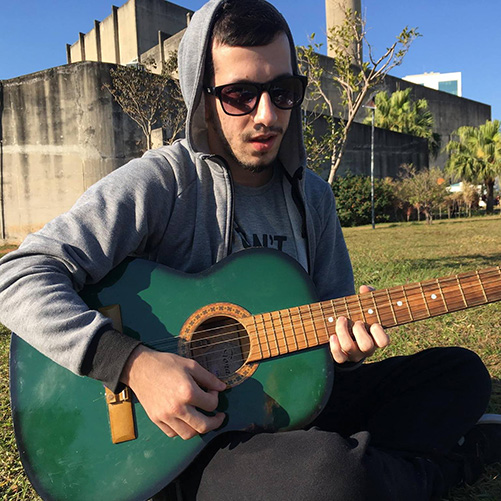 Felipe playing guitar